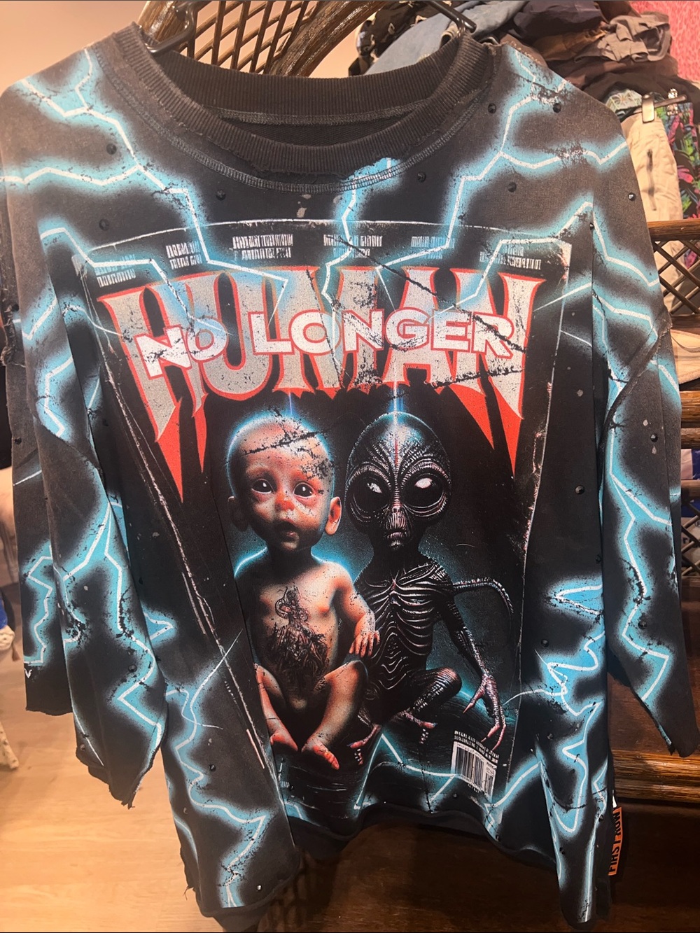 First Row Graphic Lightning Print Alien cropped shirt with rhinestones